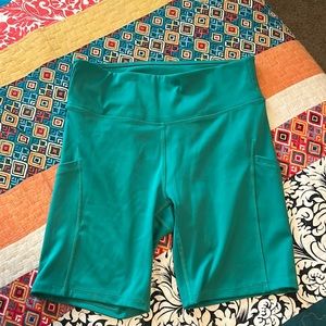 All in motion green biker shorts with pockets